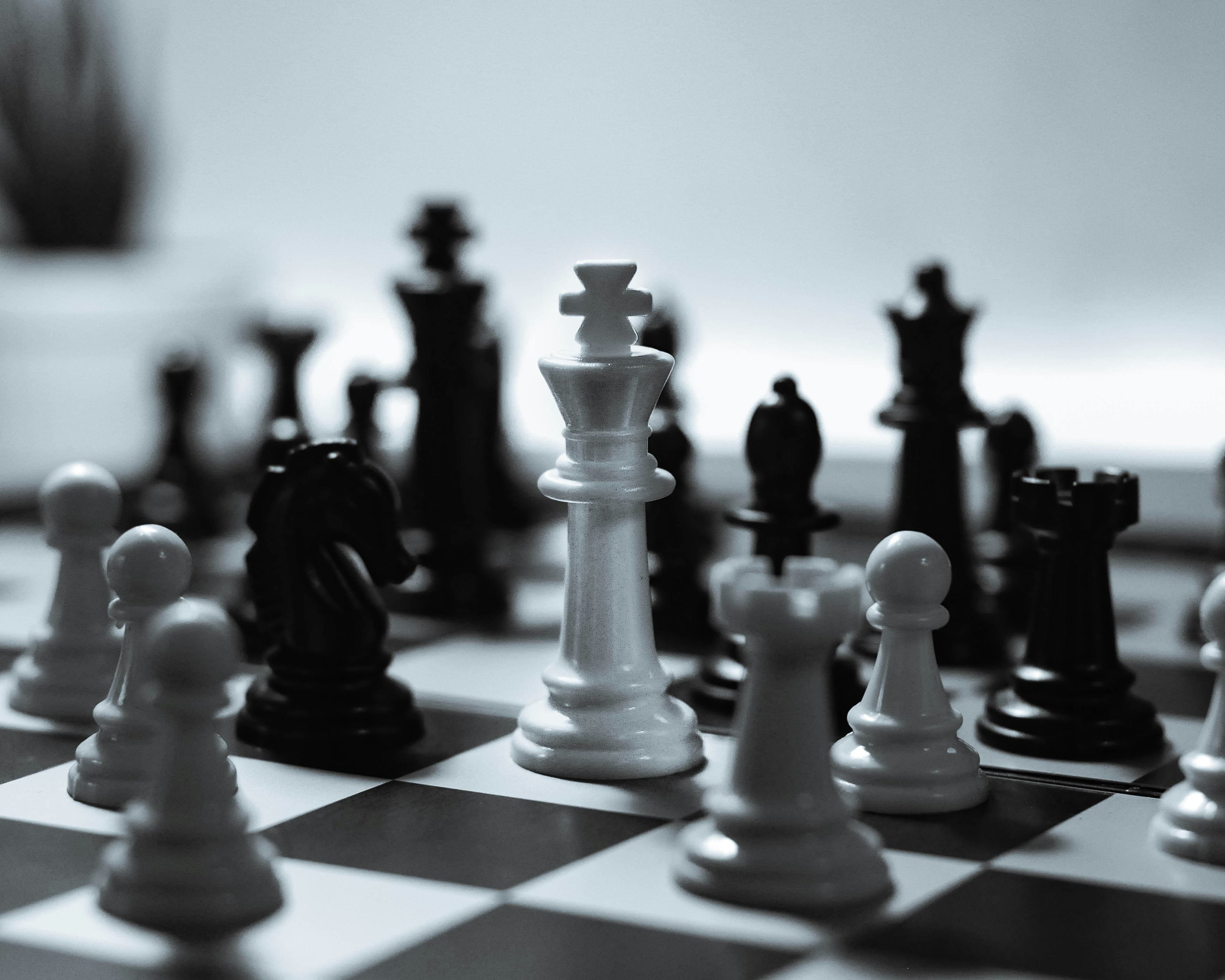 A chessboard with pieces in mid-game